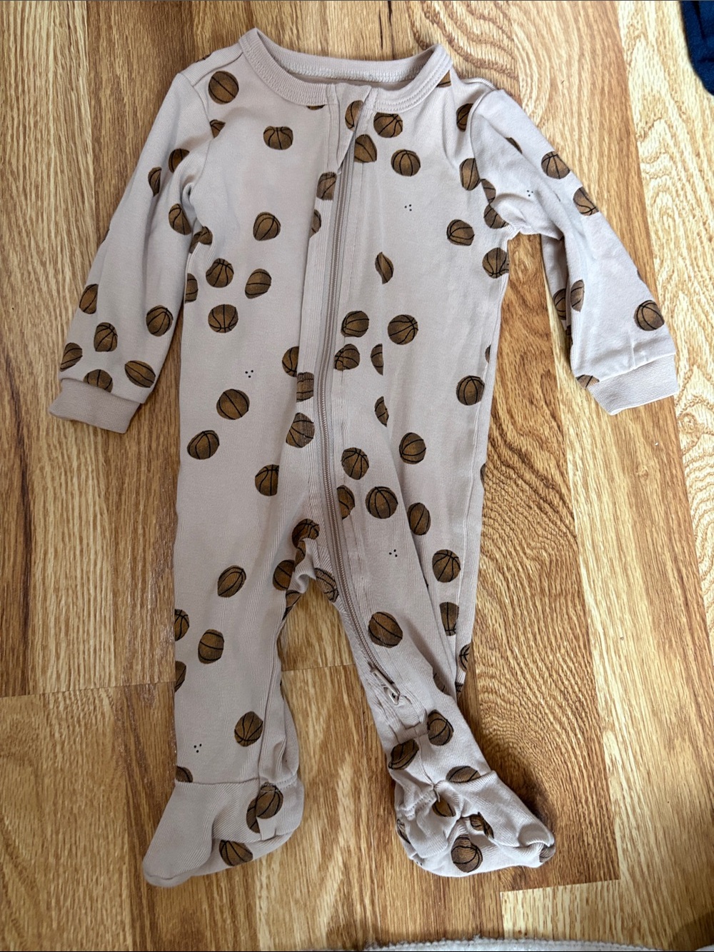 Petit Lem Beige Footed One-Piece with Brown Basketball Print